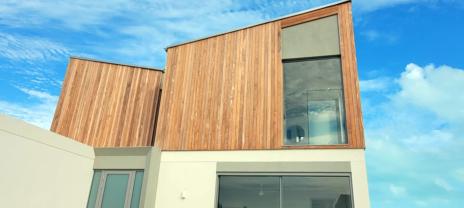 Best Exterior Wood Siding for a Coastal Hotel or Resort That Will See Heavy Salt Exposure